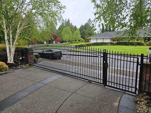 Painting or staining the fence